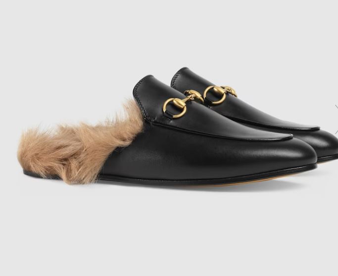 The slip-ons are dupes of these £815 Gucci slippers