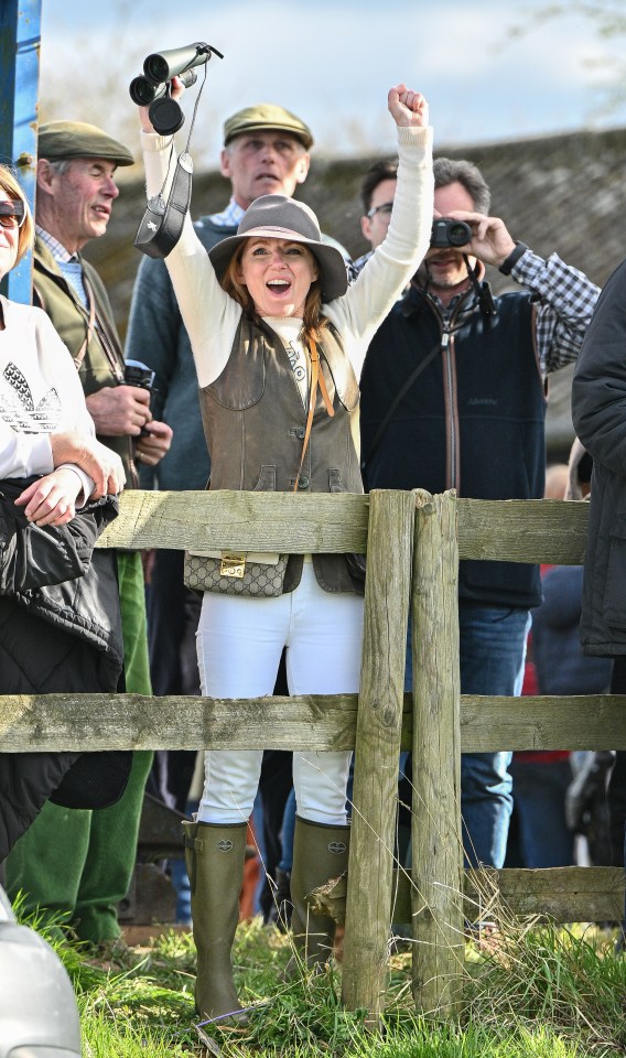 Geri celebrates as hubby Horner watches on