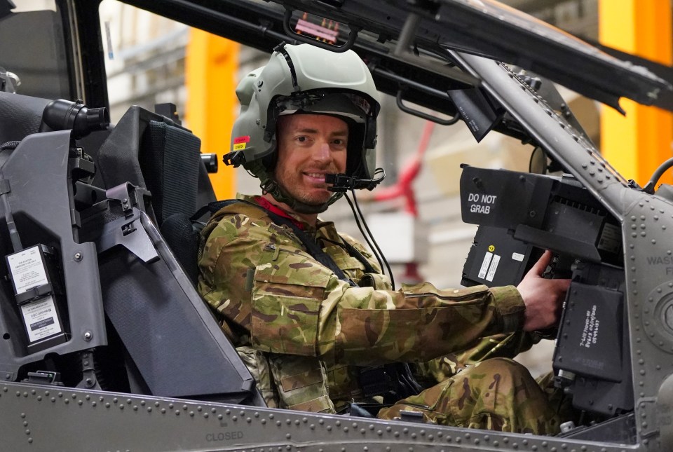 Alex in the Apache cockpit and ready to take to the skies