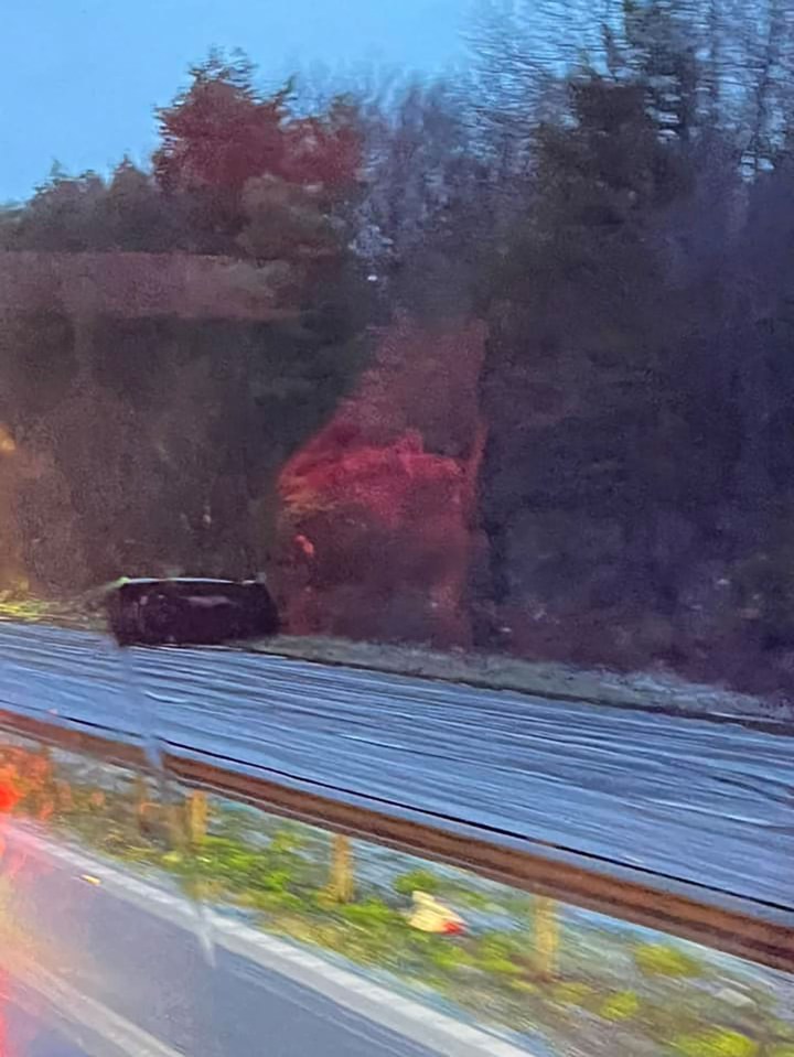 Eyewitnesses saw cars flipped over at the side of the road