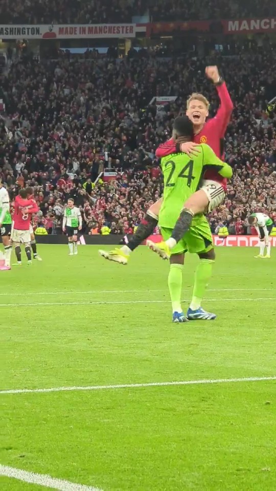 The goalie lifted the Scottish midfielder up into the air in celebration