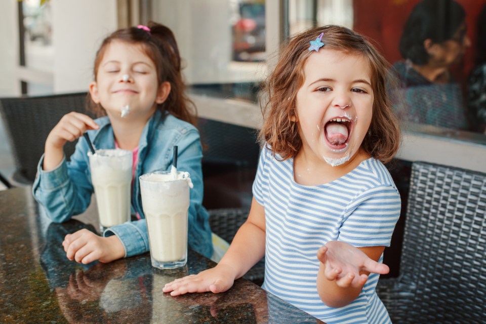 The kids were yelled at by the waitress for being naughty