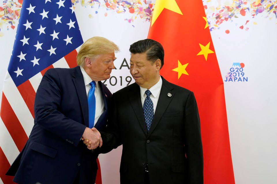 Donald Trump shakes hands with China’s Xi Jinping in June 2019