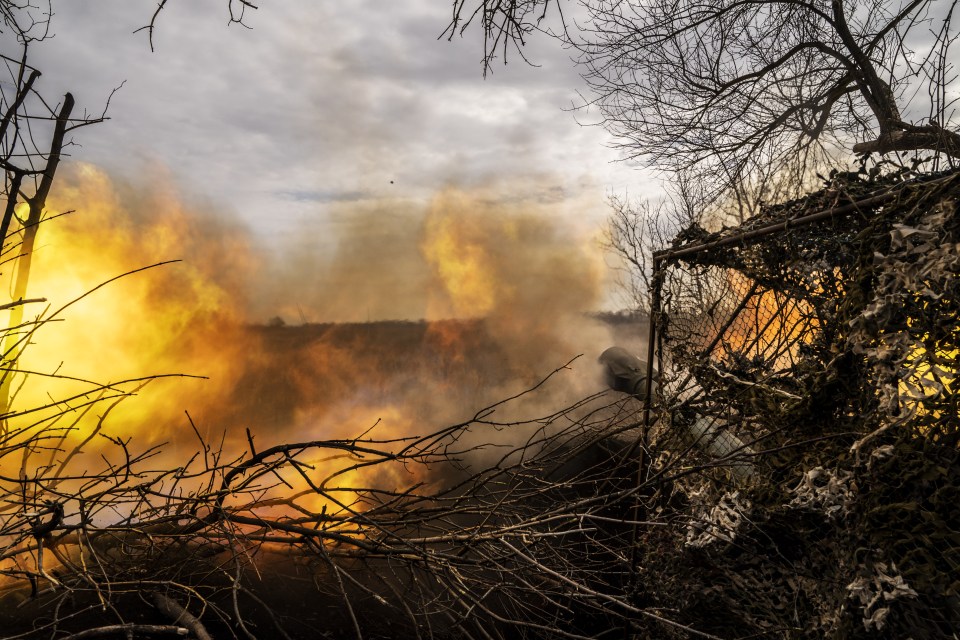 Ukrainian soldiers firing at Russian troops in Bakhmut on March 13