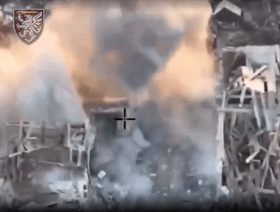 After the drone destroys its target the footage jumps to an aerial shot to show the destruction