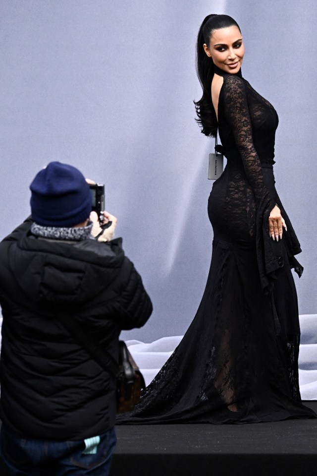 Kim Kardashian put on a priceless performance in a Balenciaga dress with the label still showing