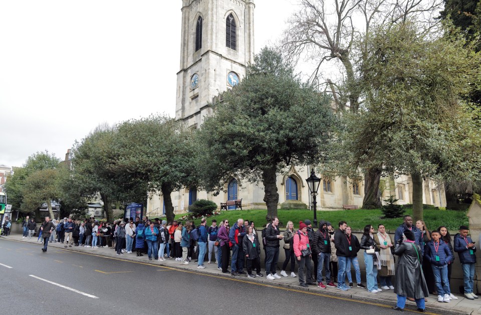 w8media ..w8media Windsor Castle Tourists ..A record number of tourists wait for over 1.5 hours to get into the castle today, the line of patient royal fans stretched down three roads this morning. After coach loads of visitors are dropped off in the historic town in Berkshire hoping to catch a glimpse of a royal whilst visiting the castle..The line of tourists started at the top od St.Albans street, down into Park street and then doubled back uptown the high street by guildhall where Kings Charles married Queen Camilla ..According to castle staff theyre fully booked up over the entire easter weekend...28/03/2024..