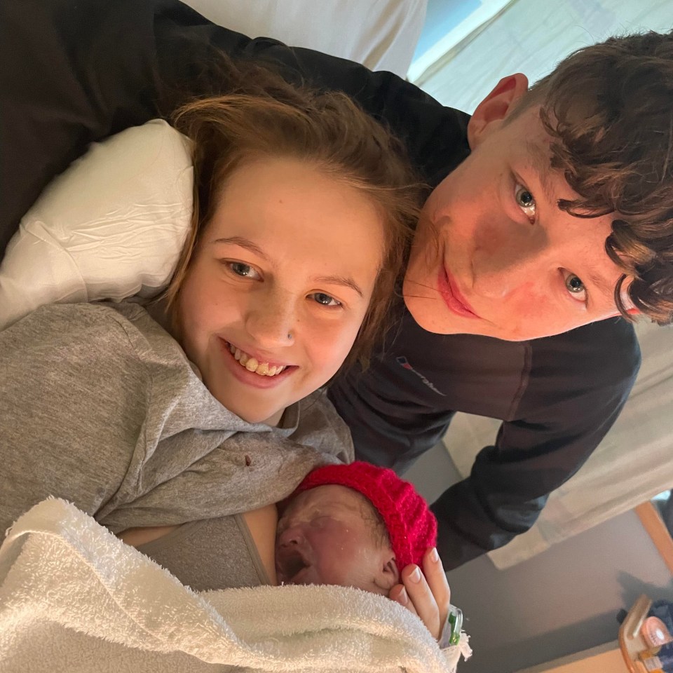 Isabelle and Joe with their baby boy, Oscar