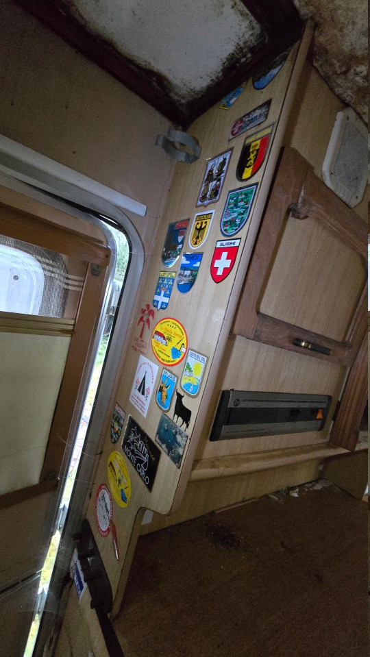 Stickers on the motor home from where it has traveled in the world