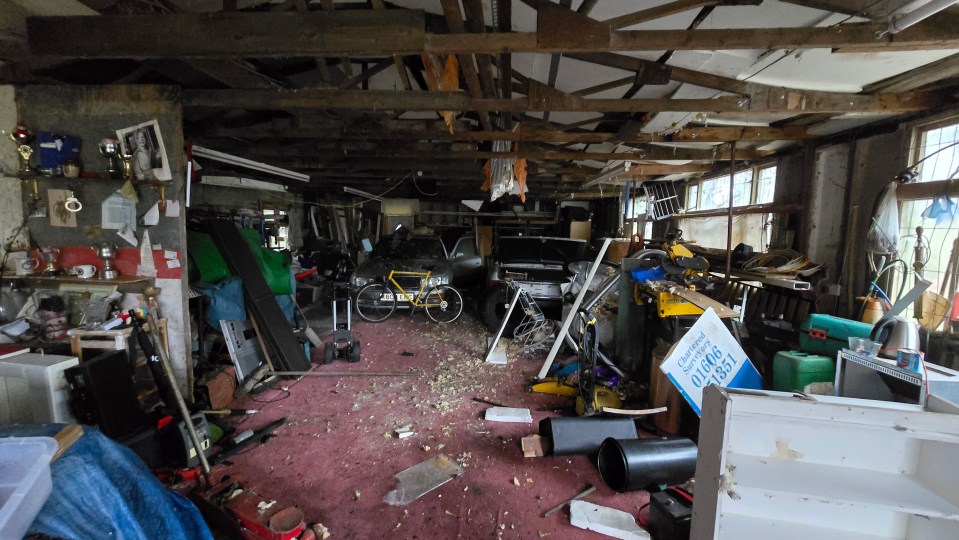 The garage is full to the brim with clutter