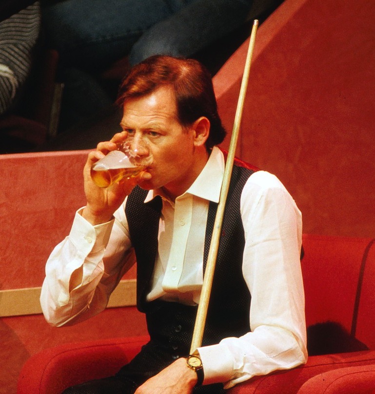 Mandatory Credit: Photo by Colorsport/REX/Shutterstock (3157162a) Snooker - World Championships 1988 Alex Higgins of Ireland drinks a pint of beer during his match at the Crucible Theatre Snooker - World Championships 1988 Sport