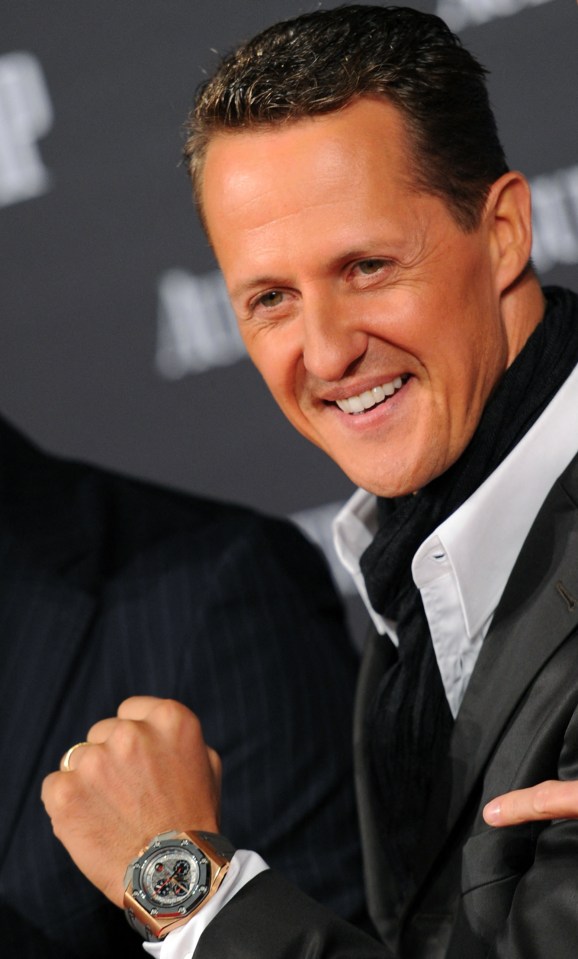 Michael Schumacher poses as he arrives for the Audemars Piguet dinner at the Kraftwerk in Berlin in October 2012