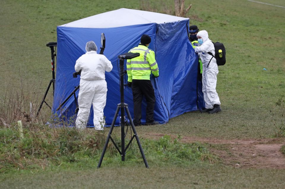 Forensic officers at the scene of the murder in 2021