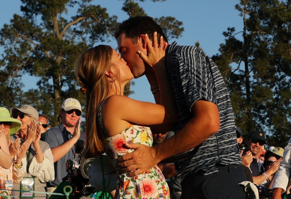 Scottie Scheffler of the US celebrates with his wife Meredith Scudder after winning The Masters in Augusta, Georgia on April 10, 2022