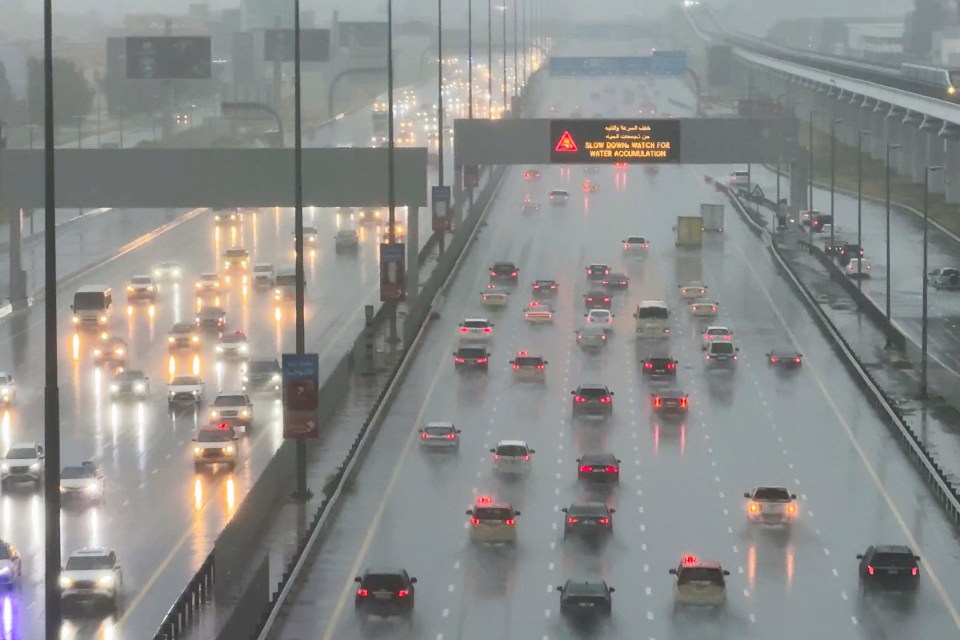 Heavy rain drenches cars on the Sheikh Zayed Road highway in Dubai