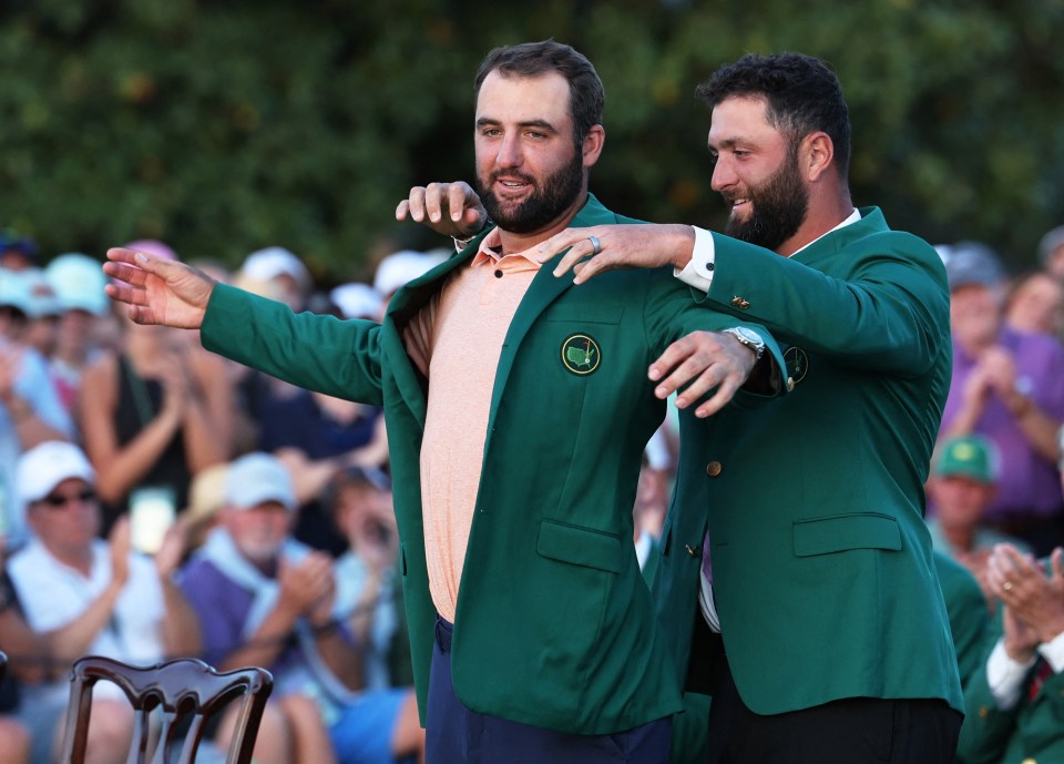 Last year’s winner Jon Rahm put the Green Jacket on Scheffler