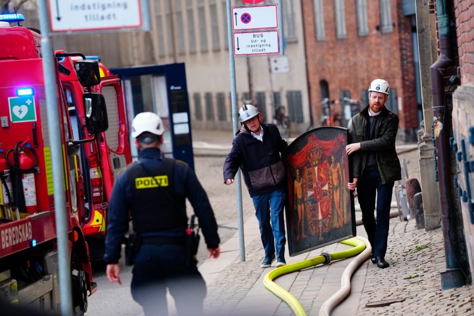 Emergency workers saving more pieces of artwork from inside