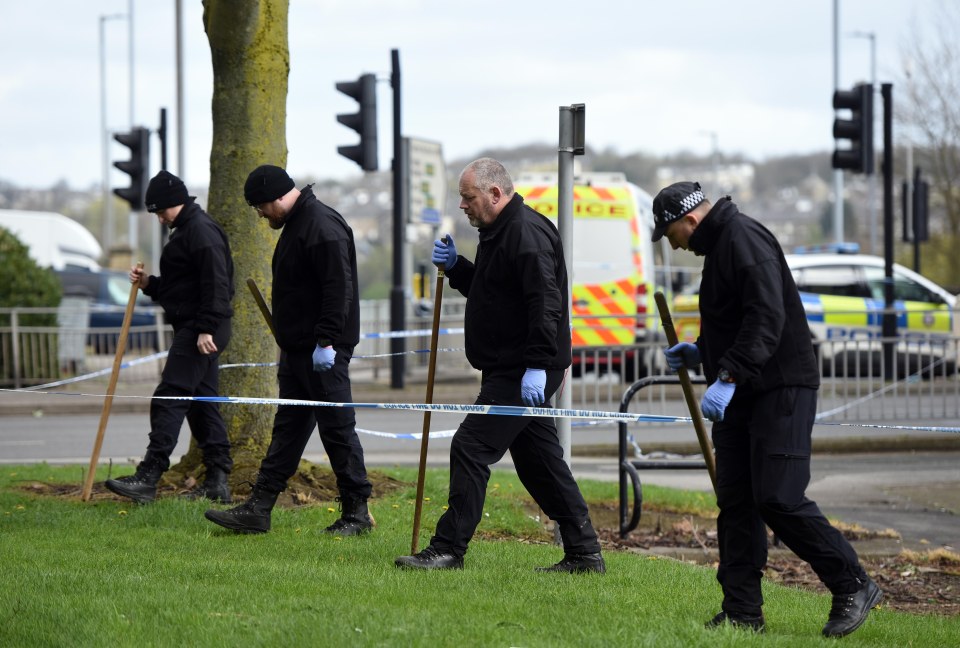 Cops combing the murder scene for evidence