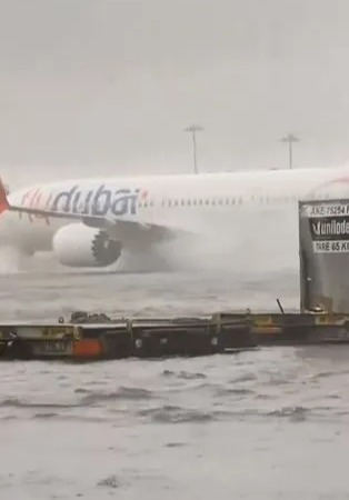 Planes are seen swimming at Dubai's International Airport