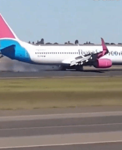 Smoke can be seen billowing from the Boeing 737 jet, which was fully loaded with passengers