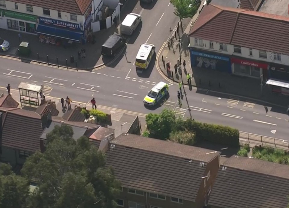 An aerial view on the street where cops remain