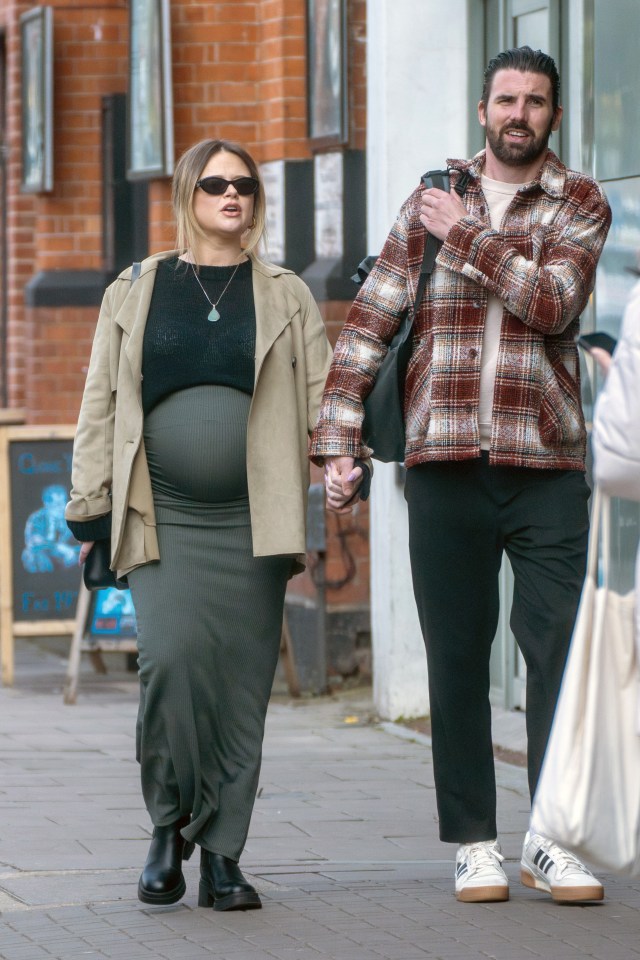 Pregnant Emily Atack was snapped showing off her baby bump