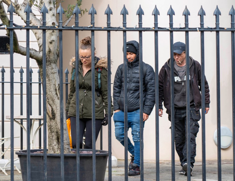 Three squatters inside the restaurants grounds