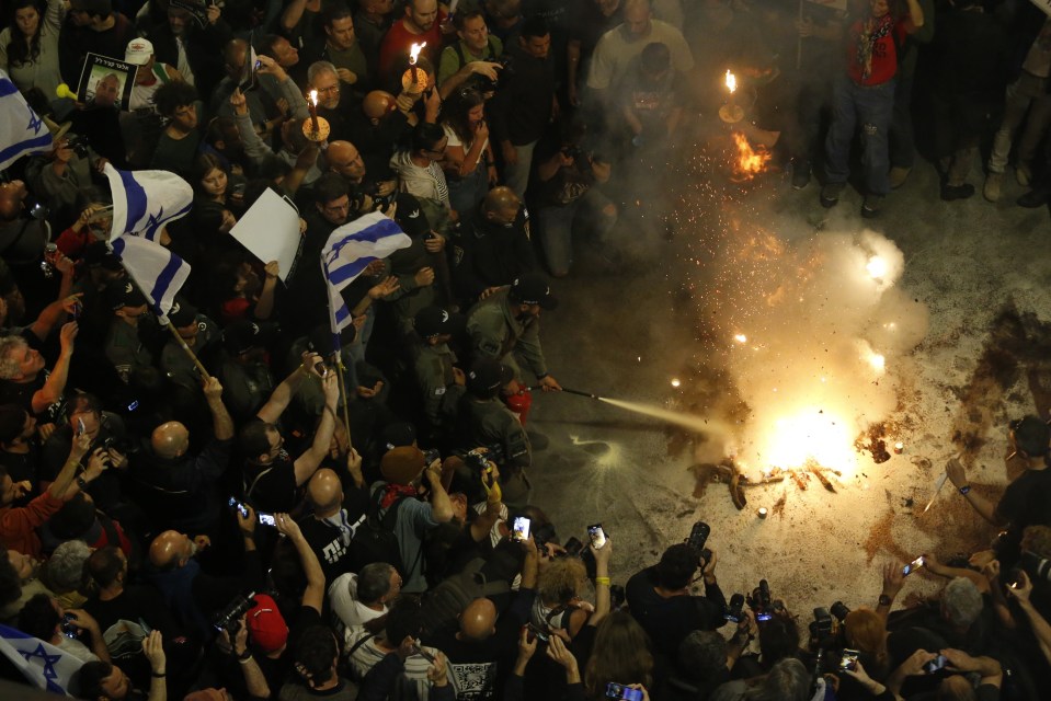 In Tel Aviv, protesters also set fires in the streets