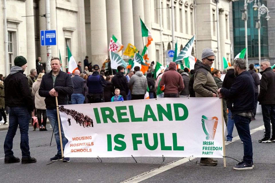 Protesters take part in the Ireland Says No anti-refugee gathering outside The Custom House in Dublin. Picture date: Monday February 5, 2024. PA Photo. Ireland has seen a rise in protests at buildings across the country earmarked to house asylum seekers. There have also been arson attacks on several buildings proposed as accommodation locations for international protection applicants. See PA story IRISH Refugees. Photo credit should read: Niall Carson/PA Wire