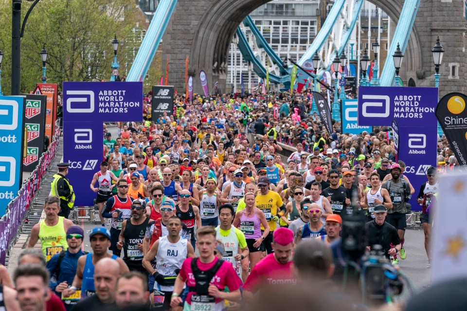 21.04.24- Runners crossing Tower Bridge whilst running the London Marathon.