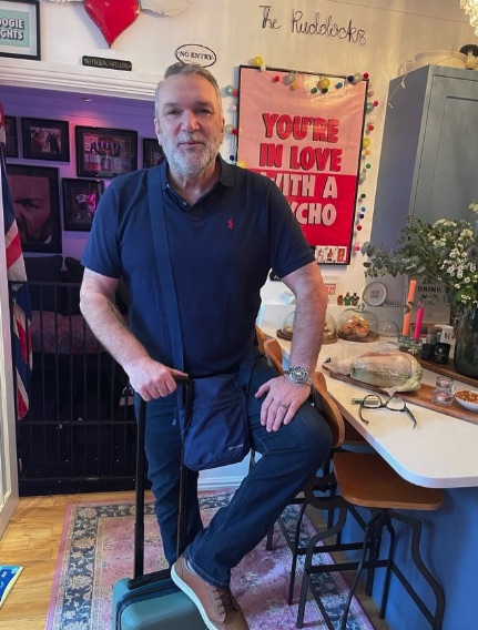 Neil 'Razor' Ruddock showed off his trim figure ahead of a trip to Alicante