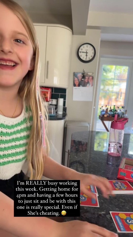 The seven-year-old giggled as she spent quality time with her mum at the kitchen table