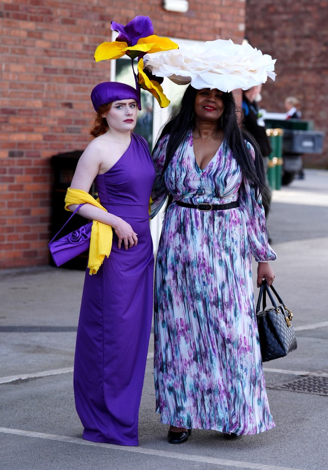 Two pals with eye-popping outfits arrived for their day of racing