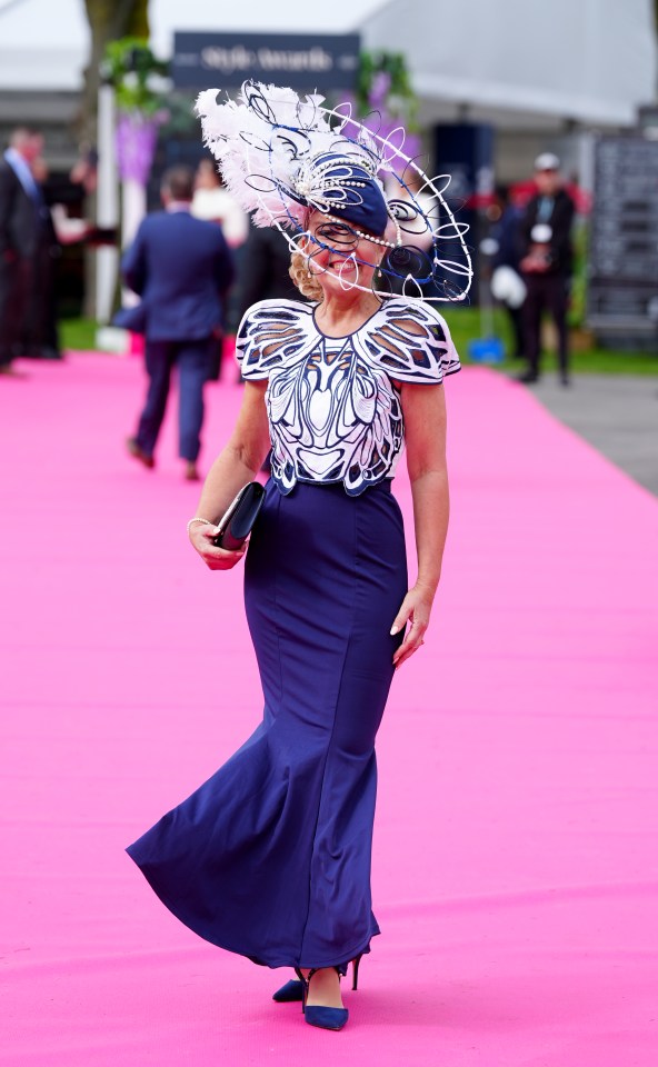 Many people have opted for dramatic headwear at today's racing bonanza