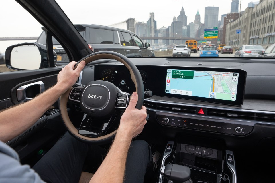 The standard “2” trim has curved display screens up top with satnav, wireless Apple CarPlay, reversing camera, heated seats and heated steering wheel