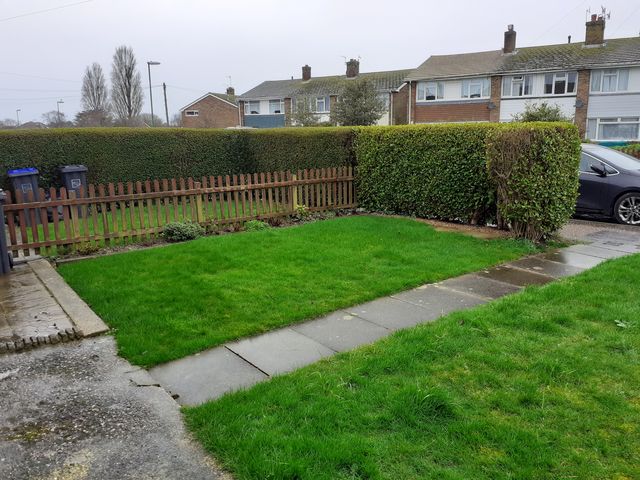 The driveway conversion is meant to allow them to park two cars directly outside the house rather than just one on the road