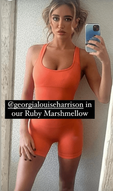 Georgia showed off her trim figure in an orange leotard