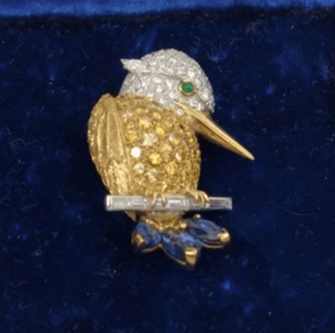 The little bird was made up of diamonds and sapphires