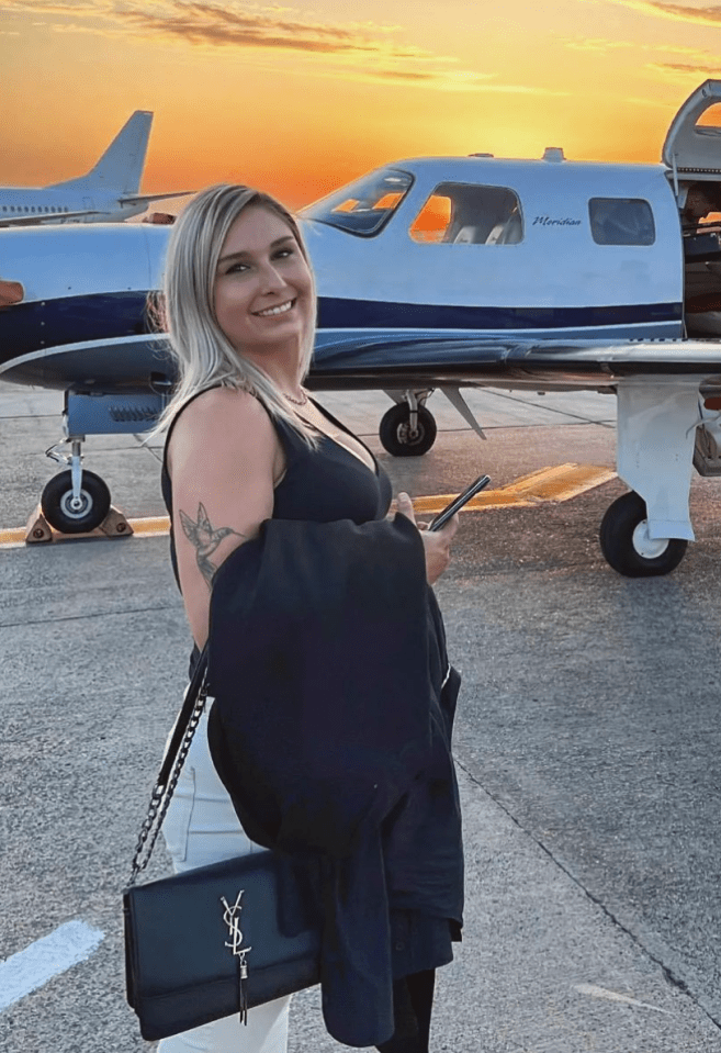 High-flying Laura loves designer handbags and flying in private jets