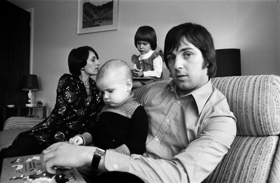 The rugby legend at home with his wife, Janet and children in 1971