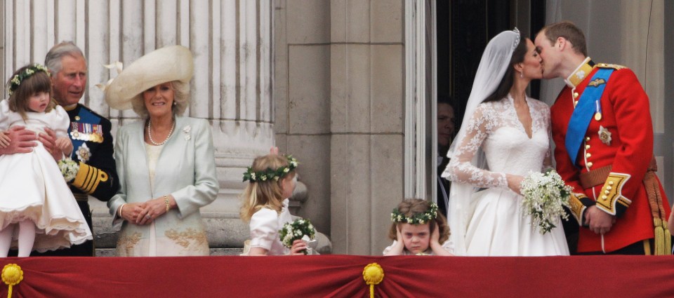 King Charles and Queen Camilla as Princess Kate and Prince William shared a kiss on the balcony after their royal wedding in 2011