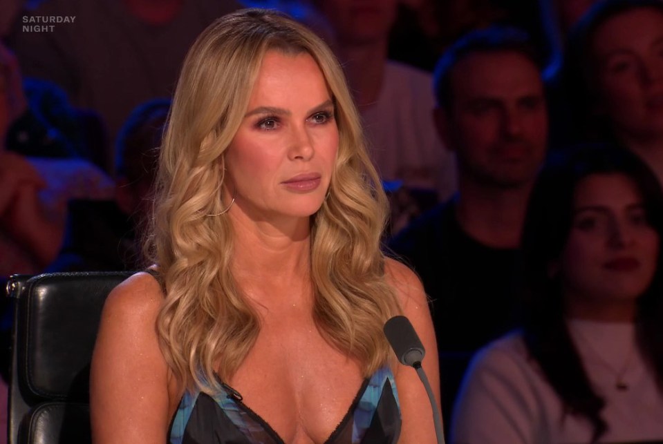 Amanda Holden looked like she didn't know what to expect when Dark Hero walked out