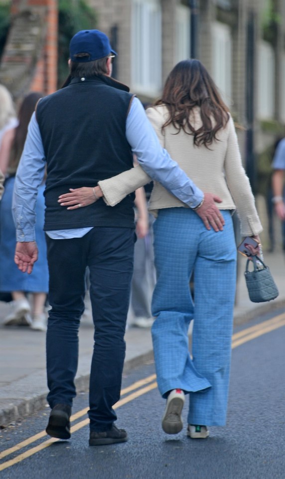 He gave his new girlfriend a cheeky pat on the bum as they were spotted in London