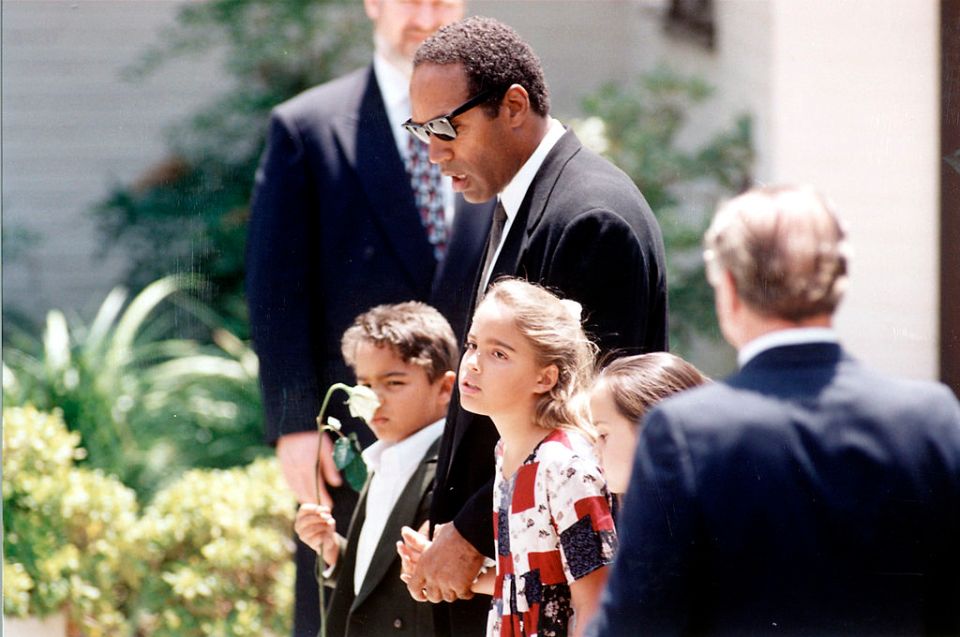 Sydney and brother Justin at their mum Nicole's funeral