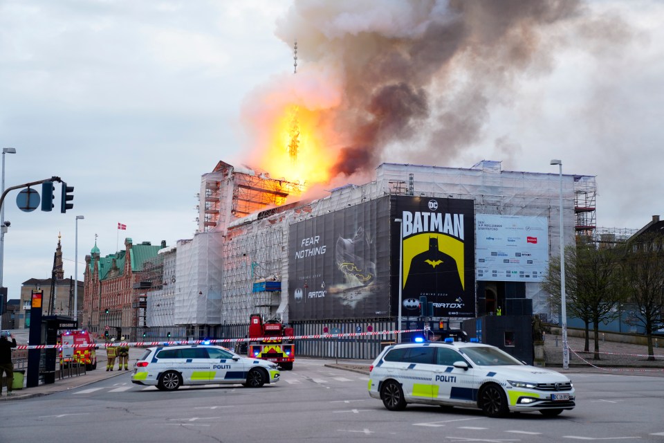 Police have closed the road around the blaze