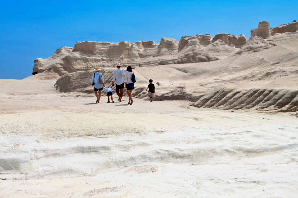 Families can explore the beach on the island of Milos in Greece