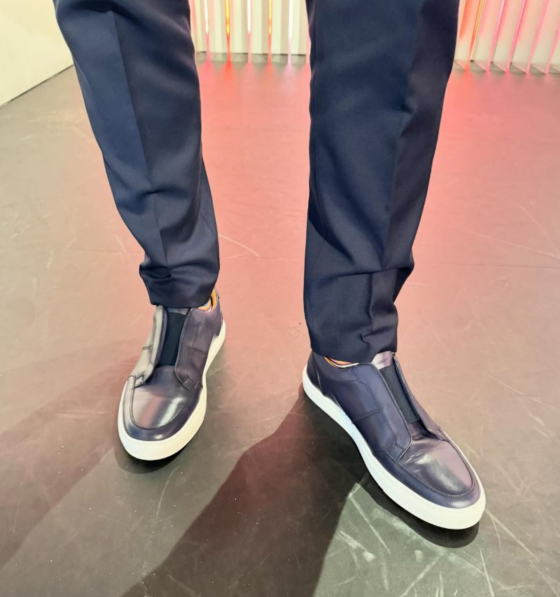 He received backlash from viewers for wearing trainers on set