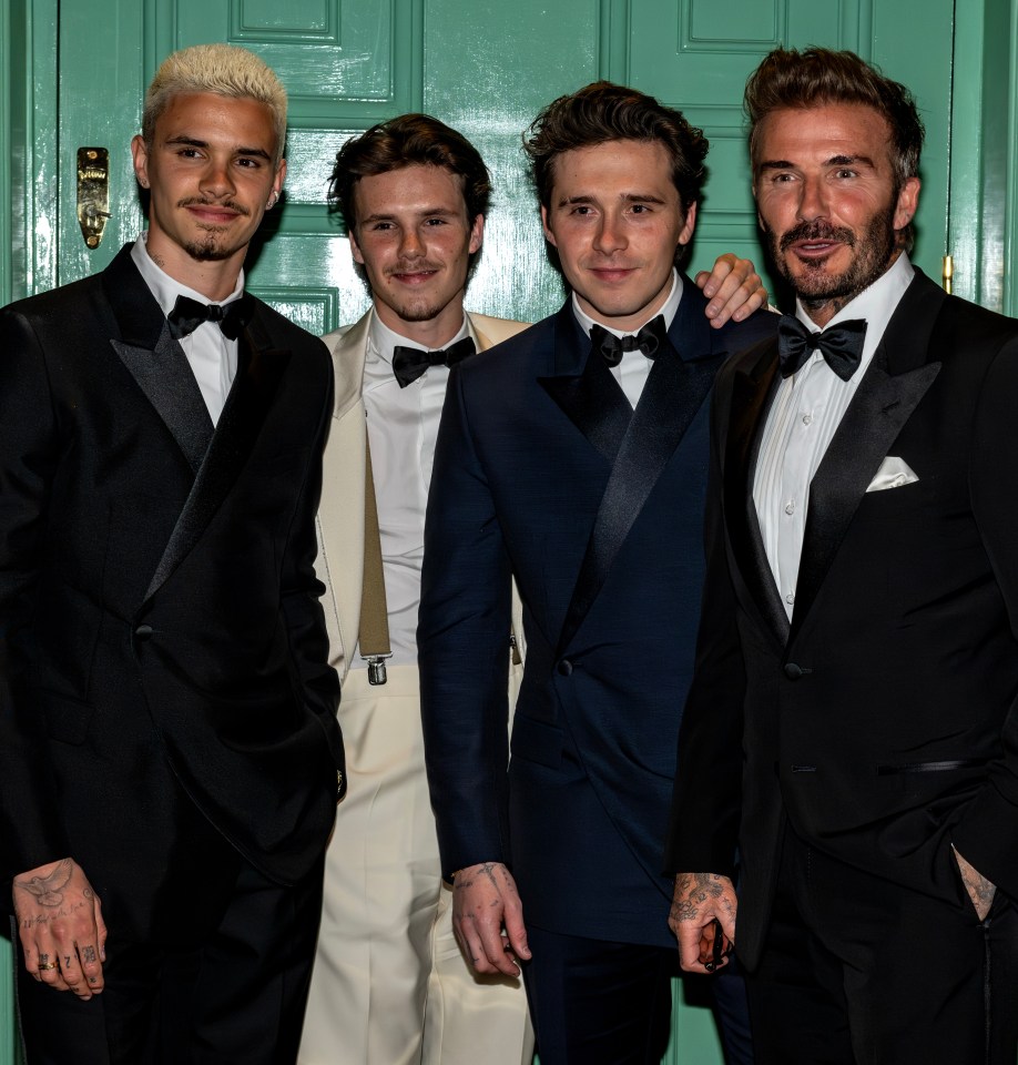 The Beckham boys (Romeo, Cruz and Brooklyn) all suited up and posed with dad David