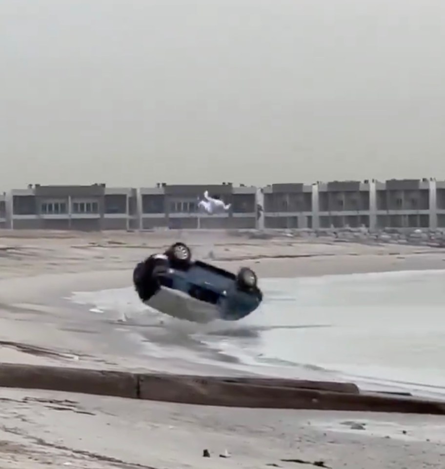 The driver is thrown high in the sky like a rag doll as his car barrel rolls into the water