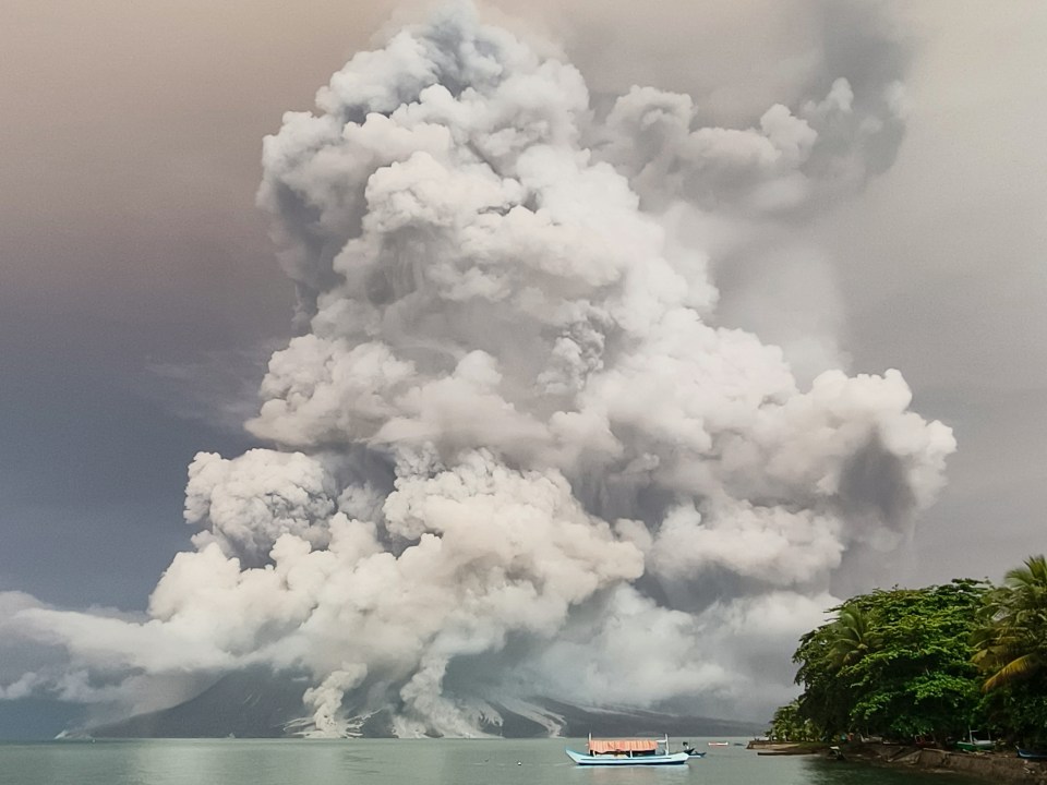 An eruption from Mount Ruang volcano is seen from Tagulandang island in Sitaro, North Sulawesi, on April 30